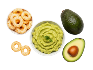 Top view mashed avocado on a bowl with snack and fresh avocado fruits, white background isolated