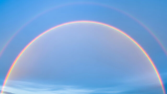 Rainbow Arc Over Blue Sky