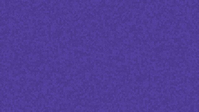 Abstract animated background featuring countless micro crystal shapes drifting and shifting organically across a soft purple surface. The fine granular motion creates a calm yet dynamic texture.