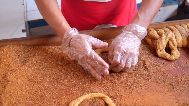 Making traditional turkish simit at local bakery 