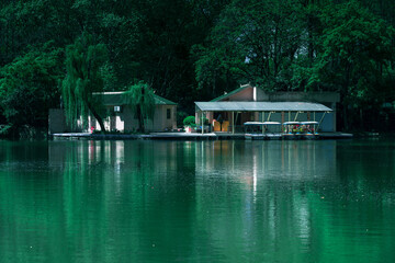 Lonely House On Distant Lake Surface View