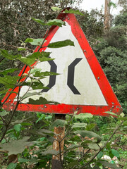 Indian road cautionary sign indicating narrow bridge ahead. Indicates the driver about a narrow bridge on the road ahead.
