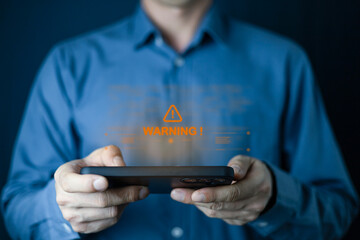 Businessman using smartphone and show notification warning aler , mobile Security warning