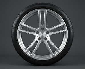 Obraz premium Close up view of a modern car wheel and tire.