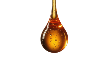 Golden droplet of honey isolated on transparent background