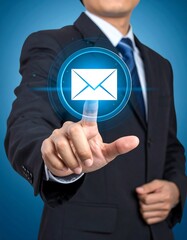 A businessperson interacts with a glowing email symbol