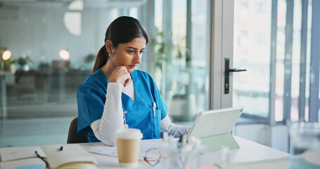 Nurse, woman or thinking with tablet in clinic for medical case review, treatment decision or...