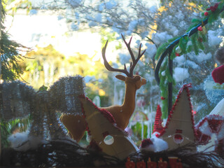 Doll cute reindeer decorated celebrate the Christmas festival. xmas background.
