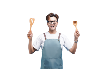 Chef's Delight: A joyful chef, donning an apron and glasses, holds a spatula and spoon aloft, ready to cook, his face radiating pure happiness.