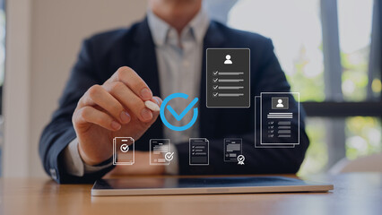 Businessman use pen digital tablet review electronic files, utilizing intelligent management system...