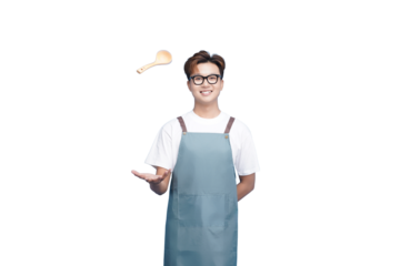 Mastering Kitchen Arts: A smiling chef juggles a wooden spoon with a sprinkle of seasoning, his focus on creating culinary excellence