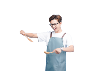 Culinary Maestro: A cheerful individual, adorned in an apron, crafts a culinary delight with a wooden spoon in hand, capturing the essence of kitchen creativity.