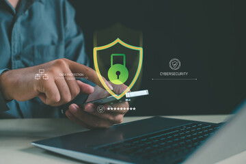 Cybersecurity and data protection concept with hands using smartphone over laptop, digital shield and lock icon, secure authentication, mobile security and online privacy.