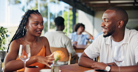 Conversation, date and love with couple in restaurant together for bonding or relationship. Relax,...
