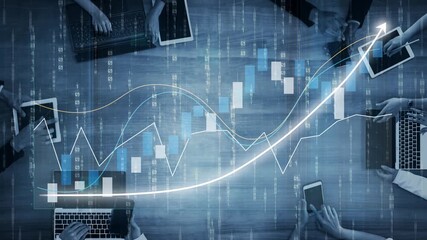 A dynamic workspace scene featuring hands engaged with laptops and digital financial graphs symbolizes collaboration in market analysis and growth strategies. Copula - Powered by Adobe