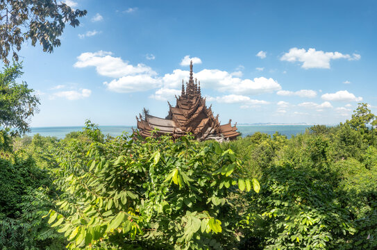 Panoramic view of the coast and rain forests of Pattaya, Thailand, with the shrine of thruth temple prominent in the skyline