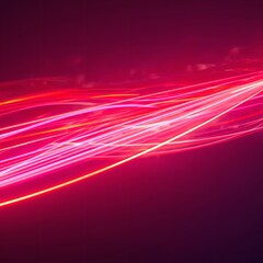 Vibrant red and pink neon light trails abstract background with glowing streaks and dynamic movement
