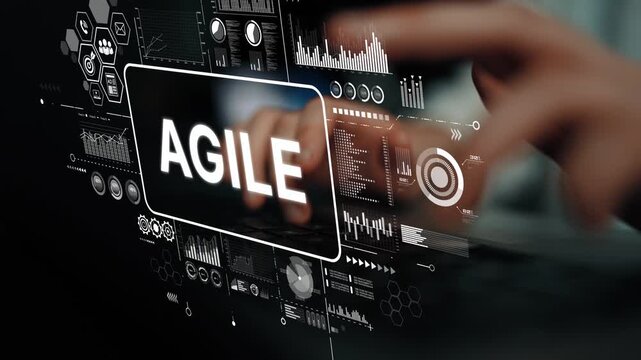 Hands Typing on a Keyboard Overlaid with Digital Data and the Word Agile Representing Project Management and Software Development. Asymptotic smart data analytic.