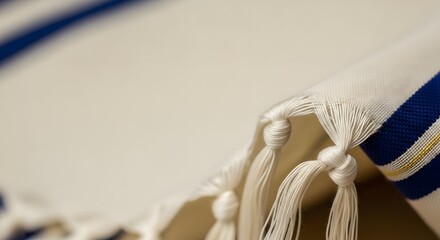 Traditional Jewish prayer shawl tallit with blue stripes, symbolizing faith and heritage for a Hanukkah celebration concept