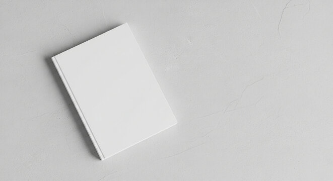 Minimalist white blank notebook cover placed on a light textured background with ample copy space. Clean and modern concept suitable for book cover mockups, branding, publishing, education, business p