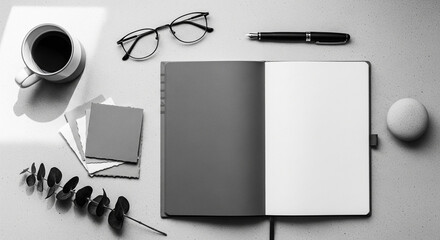 Flat lay photo of a minimal workspace featuring an open notebook with blank pages, coffee cup, eyeglasses, pen, paper samples, and decorative plant on a neutral surface. Clean and modern concept suita