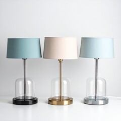 Three matching table lamps with colored shades and glass bases