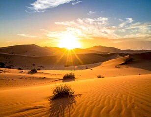 Golden desert dunes ripple under a radiant sun, with sparse vegetation in the foreground