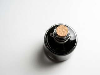Wine bottle with cork on white background