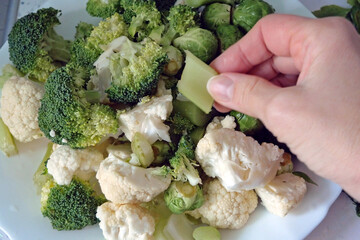 Oven baked broccoli and cauliflower on plate