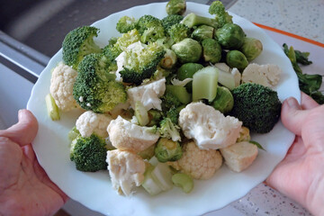 Oven baked broccoli and cauliflower on plate