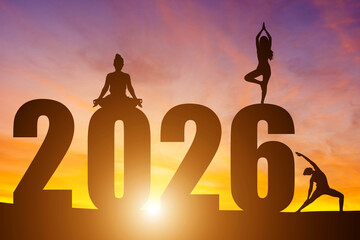 Happy New Year Numbers 2026, Silhouette woman practicing yoga early morning sunrise over the horizon background, Health and Happy new year concept.