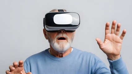 Senior man exploring virtual reality with VR headset and amazed expression