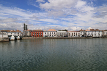 Fototapeta premium View of the Gilao River with the skyline of the Portuguese city of Tavira, Algarve, Portugal