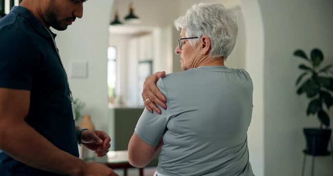 Shoulder pain, physiotherapy and man with mature woman for consulting, recovery and medical service. Healthcare, clinic and chiropractor with patient for physical therapy, support and wellness - Powered by Adobe