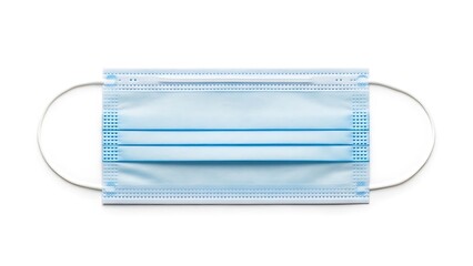 A light blue disposable medical face mask with elastic straps isolated on a white background