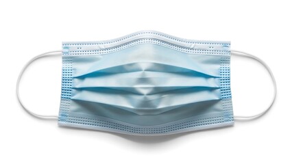 A blue surgical face mask on a white background viewed from directly above