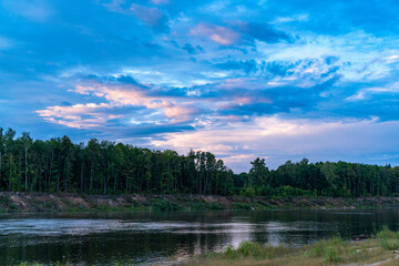 Sunset on the cloudy river.