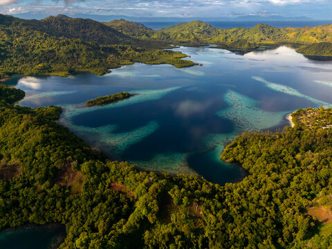 Aerial view of South Pacific island with coral reef