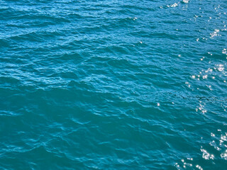 Obraz premium Ocean blue waters surface background.