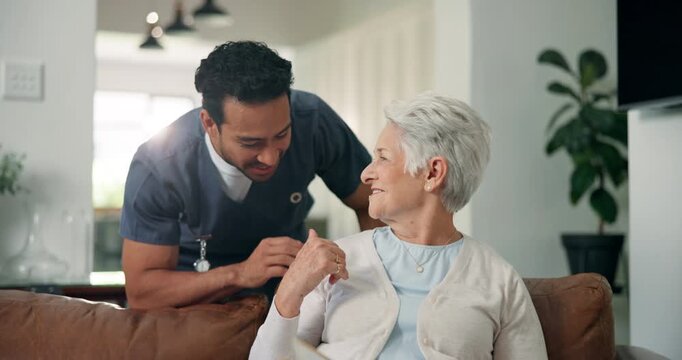 Smile, talking and nurse with old woman on sofa for medical, advice, support and retirement. Elderly care, healthcare and caregiver with senior patient and man in living room of nursing home for help