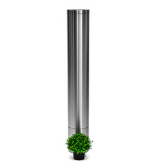A tall, metallic column stands upright with a small, green shrub at its base.