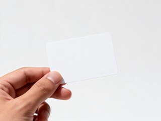 Obraz premium Hand holding blank white card
