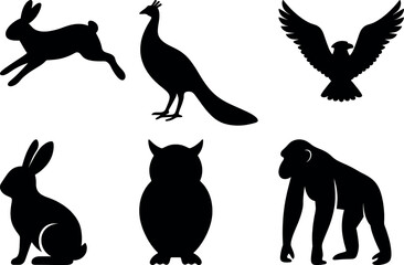 Assorted animal and bird silhouettes with jumping rabbit, peacock, flying eagle, sitting bunny, owl, and gorilla.