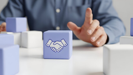Lavender cube with a white handshake icon and a hand reaching towards it.