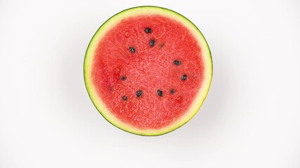 Macro texture of rotating fresh watermelon flesh. Red fruit pulp background with seeds. - Powered by Adobe