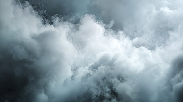 Moody and dramatic sky filled with swirling dark and light grey storm clouds