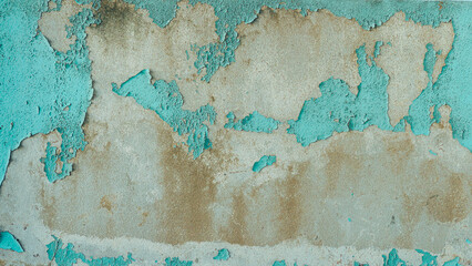 Peeling turquoise paint on old concrete wall texture, Abstract weathered and cracked cement surface.