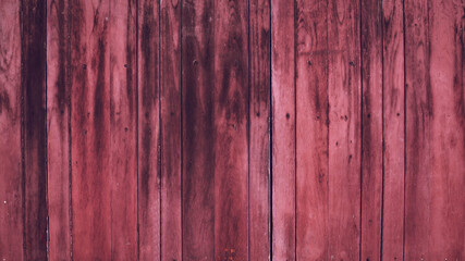 Vintage dusty pink wood wall texture background, rustic rosewood vertical plank surface with natural grain.