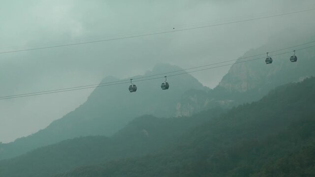 Mountain cableways transport tourists