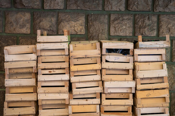 A stack of wooden crates piled on top of each other.

